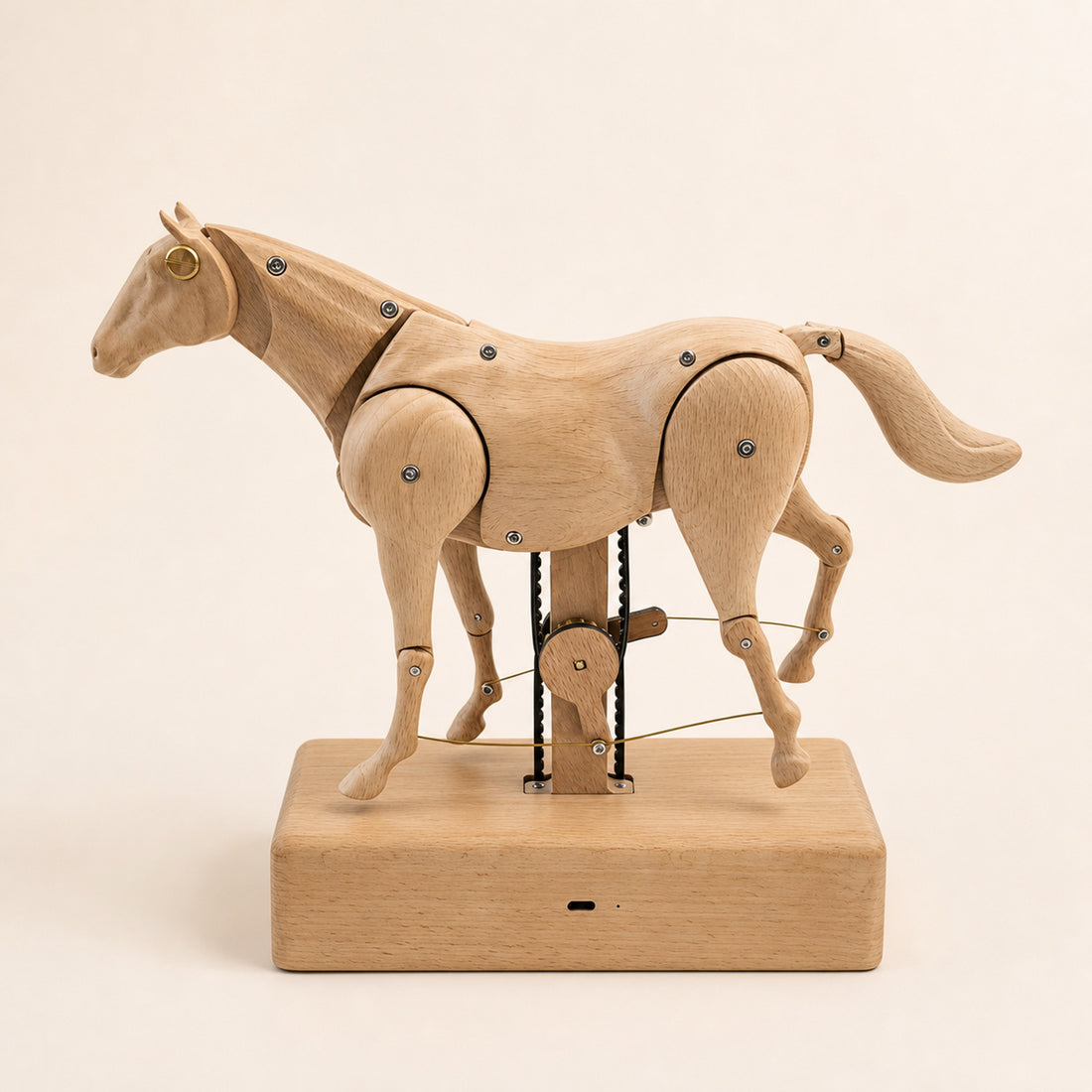 Handcrafted Wooden Horse Automaton on a warm ivory studio background