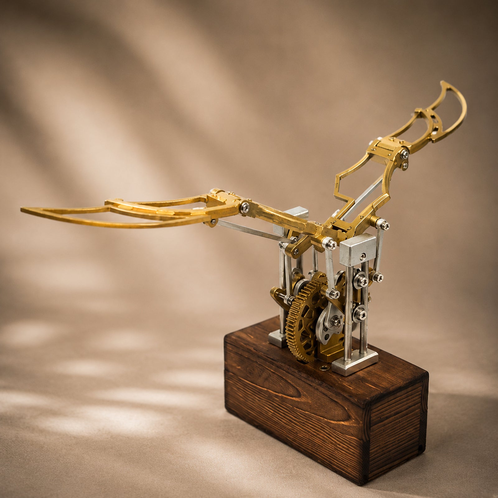 Gold Kinetic Angel Wings Sculpture angle view