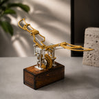Gold Kinetic Angel Wings Sculpture in a warm modern interior